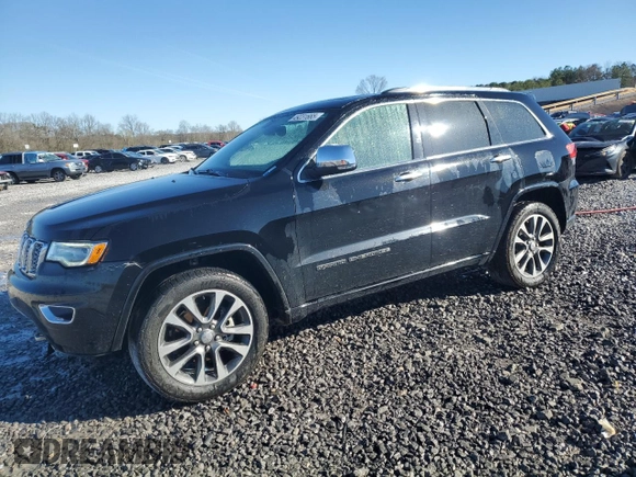 2017 Jeep Grand Cherokee Overland z VIN 1C4RJFCG9HC663433, wystawiony jako Copart lot #49231665 z przebiegiem 171 721 mil mil oraz Szkoda całkowita • Salvage title. Historia ofert i sprzedaży dostępna na DreamBid. Obrazek 1.