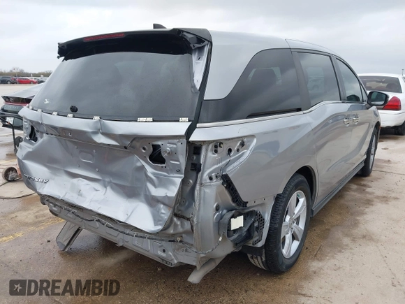 2018 Honda Odyssey EX-L with VIN 5FNRL6H73JB105024, listed as a IAAI auction lot 41663862 with 76,172 mi miles. Bid and sale history available at carsss.com. Image 4.