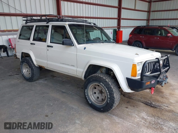 1996 Jeep Cherokee Sport with VIN 1J4FJ68S5TL259449, listed as a IAAI auction lot 42376697 with 72,835 mi miles and . Bid and sale history available at DreamBid. Image 1.