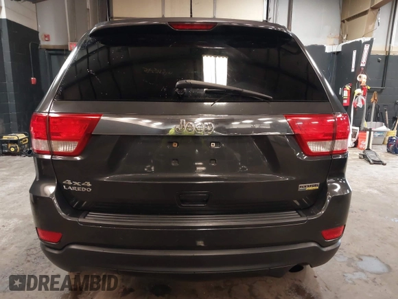 2011 Jeep Grand Cherokee 70th Anniversary with VIN 1J4RR4GG3BC566690, listed as a IAAI auction lot 41810545 with 173,886 mi miles. Bid and sale history available at carsss.com. Image 16.