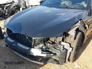 2019 BMW 5 Series M550i xDrive with VIN WBAJB9C56KB464957, listed as a IAAI auction lot 41729334 with Not provided miles and . Bid and sale history available at DreamBid. Image 6.