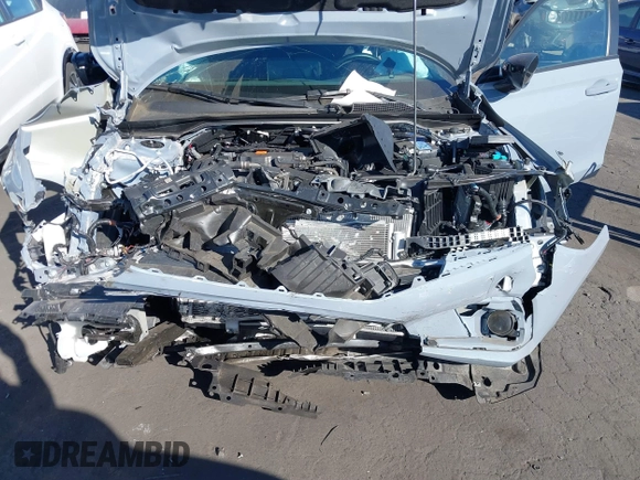 2023 Honda Civic Sport z VIN 2HGFE2F50PH556813, wystawiony jako IAAI lot #41364523 z przebiegiem 8 999 mil mil oraz . Historia ofert i sprzedaży dostępna na DreamBid. Obrazek 18.