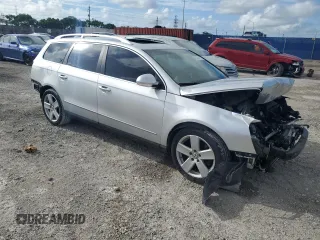 2009 Volkswagen Passat Komfort with VIN WVWXK73C09E140427, listed as a Copart auction lot 60374115 with 113,923 mi miles and Salvage title. Bid and sale history available at DreamBid. Image 4.