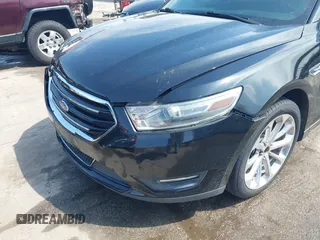 2014 Ford Taurus Limited with VIN 1FAHP2F80EG104984, listed as a IAAI auction lot 41910463 with 174,034 mi miles. Bid and sale history available at carsss.com. Image 6.