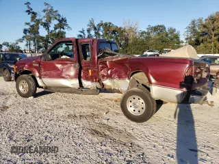 2000 Ford F-250 XL with VIN 1FTNX21L6YEE29549, listed as a Copart auction lot 74982324 with 133,883 mi miles and Salvage title. Bid and sale history available at DreamBid. Image 2.