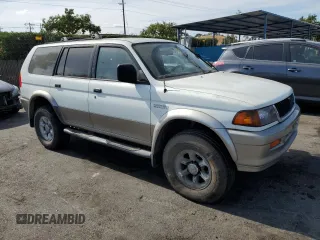 1998 Mitsubishi Montero z VIN JA4LS31P1WP029117, wystawiony jako Copart lot #72069334 z przebiegiem 172 069 mil mil oraz Szkody całkowita. Historia ofert i sprzedaży dostępna na DreamBid. Obrazek 4.