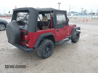 1999 Jeep Wrangler SE with VIN 1J4FY29P6XP408738, listed as a IAAI auction lot 41716999 with 124,692 mi miles. Bid and sale history available at carsss.com. Image 4.