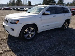 2014 Jeep Grand Cherokee Overland with VIN 1C4RJFCM6EC555482, listed as a Copart auction lot 47474075 with 158,015 mi miles and Salvage Title. Bid and sale history available at carsss.com. Image 1.