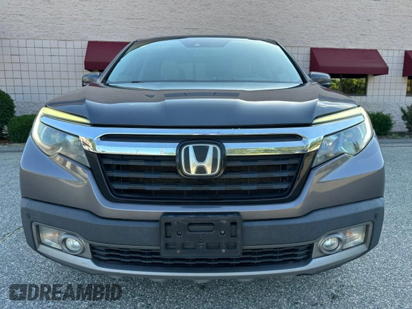 2019 Honda Ridgeline RTL-E with VIN 5FPYK3F71KB009532, listed as a Copart auction lot 65827935 with 217,177 mi miles and Clean title. Bid and sale history available at DreamBid. Image 13.