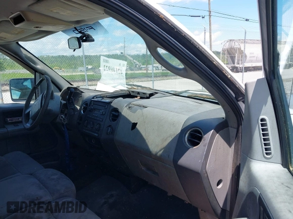 2005 Ford F-150 XL with VIN 1FTRF12W25NA55492, listed as a IAAI auction lot 42146922 with 183,461 mi miles and . Bid and sale history available at DreamBid. Image 5.