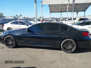 2015 BMW 6 Series 640i with VIN WBA6A0C52FGB53591, listed as a IAAI auction lot 41247695 with 81,828 mi miles and . Bid and sale history available at DreamBid. Image 14.