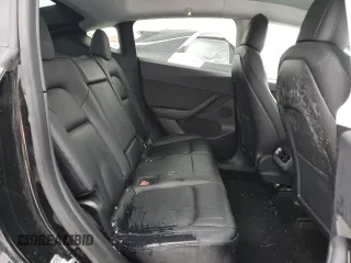 2021 Tesla Model Y Long Range z VIN 5YJYGDEE6MF089008, wystawiony jako Copart lot #45304715 z przebiegiem 140 761 mil mil oraz Szkoda całkowita • Salvage title. Historia ofert i sprzedaży dostępna na DreamBid. Obrazek 11.