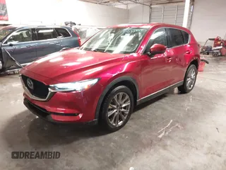 2020 Mazda CX-5 Grand Touring with VIN JM3KFBDM1L1809951, listed as a IAAI auction lot 41345854 with 117,376 mi miles. Bid and sale history available at carsss.com. Image 18.