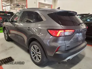 2021 Ford Escape SEL Hybrid with VIN 1FMCU9CZ4MUB25853, listed as a IAAI auction lot 42026329 with 109,084 mi miles and . Bid and sale history available at DreamBid. Image 1.