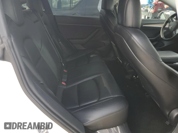 2021 Tesla Model 3 Standard Range Plus z VIN 5YJ3E1EA8MF098935, wystawiony jako Copart lot #53267905 z przebiegiem 116 673 mil mil oraz Szkody całkowita. Historia ofert i sprzedaży dostępna na DreamBid. Obrazek 10.