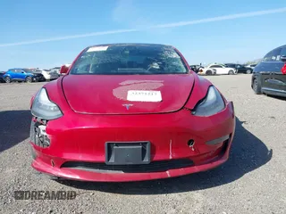 2020 Tesla Model 3 Standard Range Plus with VIN 5YJ3E1EA7LF706636, listed as a IAAI auction lot 32371217 with 35,389 mi miles. Bid and sale history available at carsss.com. Image 12.