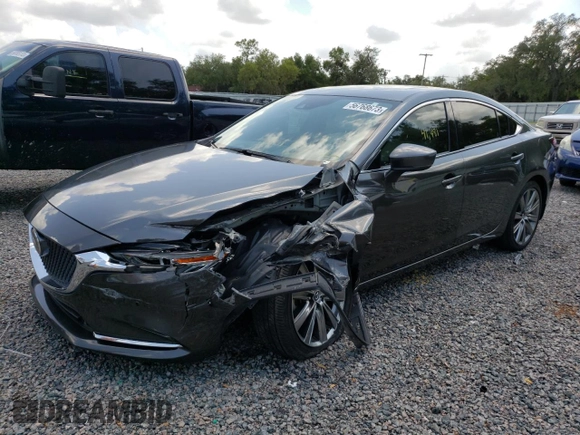 2020 Mazda 6 Signature with VIN JM1GL1XY5L1525321, listed as a Copart auction lot 56768673 with 41,481 mi miles and . Bid and sale history available at DreamBid. Image 1.