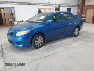 2009 Toyota Corolla with VIN JTDBL40E699037792, listed as a IAAI auction lot 41838231 with 199,690 mi miles. Bid and sale history available at carsss.com. Image 2.