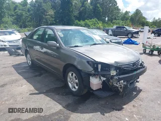 2006 Toyota Camry STD with VIN 4T1BE32K86U731458, listed as a IAAI auction lot 42290552 with 232,498 mi miles and . Bid and sale history available at DreamBid. Image 1.