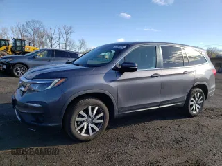 2022 Honda Pilot EX-L with VIN 5FNYF6H55NB023156, listed as a Copart auction lot 52269325 with 43,563 mi miles and Salvage title. Bid and sale history available at DreamBid. Image 1.