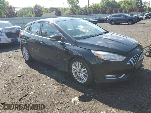 2017 Ford Focus Titanium with VIN 1FADP3N2XHL207729, listed as a Copart auction lot 59184855 with 146,768 mi miles and Salvage title. Bid and sale history available at DreamBid. Image 4.