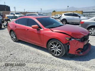2014 Mazda 6 i Grand Touring с VIN JM1GJ1W64E1121399, выставлен на аукционе Copart как лот 57513405 с пробегом 161 286 миль миль и Списание • Salvage title. История ставок и продаж доступна на DreamBid. Изображение 4.