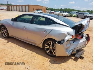 2016 Nissan Maxima SR with VIN 1N4AA6AP7GC389606, listed as a IAAI auction lot 42451614 with 114,957 mi miles and . Bid and sale history available at DreamBid. Image 3.