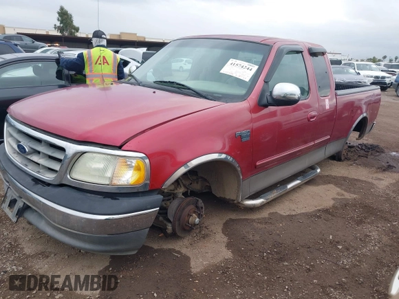 2002 Ford F-150 XL with VIN 1FTRX17W72NB88475, listed as a IAAI auction lot 41574244 with 200,396 mi miles. Bid and sale history available at carsss.com. Image 2.