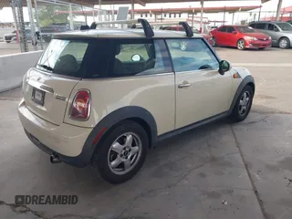 2010 MINI Hardtop with VIN WMWMF3C53ATZ25765, listed as a IAAI auction lot 42805681 with 108,796 mi miles and . Bid and sale history available at DreamBid. Image 4.