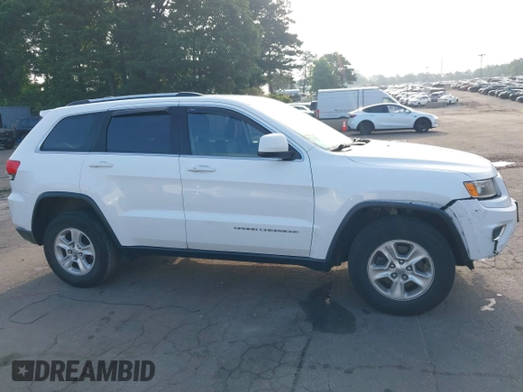2016 Jeep Grand Cherokee Laredo with VIN 1C4RJFAG0GC324917, listed as a IAAI auction lot 42709325 with 271,953 mi miles and . Bid and sale history available at DreamBid. Image 14.