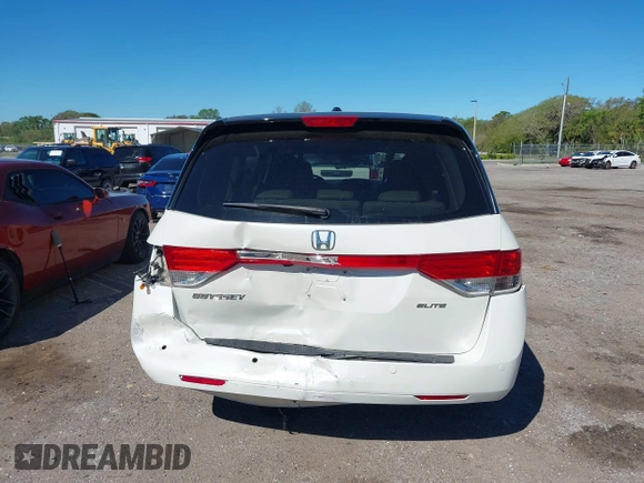 2015 Honda Odyssey Touring Elite with VIN 5FNRL5H96FB090702, listed as a IAAI auction lot 41825889 with 118,157 mi miles and . Bid and sale history available at DreamBid. Image 17.