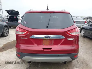 2015 Ford Escape Titanium with VIN 1FMCU0J98FUC07196, listed as a IAAI auction lot 41930660 with 51,161 mi miles and . Bid and sale history available at DreamBid. Image 16.