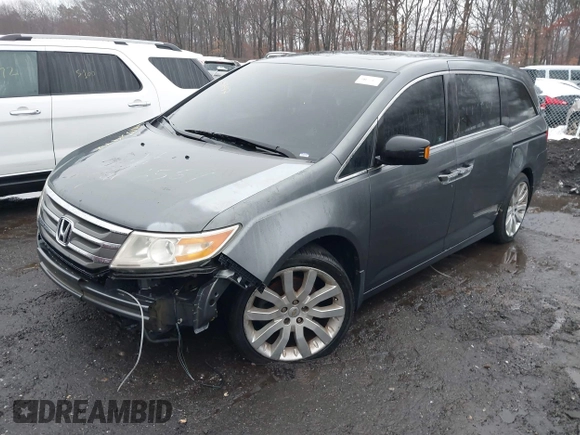 2012 Honda Odyssey Touring with VIN 5FNRL5H98CB089871, listed as a IAAI auction lot 41351447 with 999,999 mi miles. Bid and sale history available at carsss.com. Image 16.