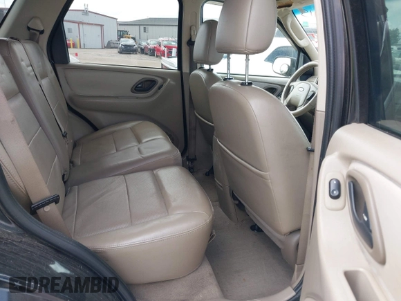 2005 Ford Escape Limited with VIN 1FMYU04155KE48512, listed as a IAAI auction lot 42196239 with 307,005 mi miles and . Bid and sale history available at DreamBid. Image 8.