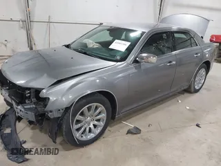 2012 Chrysler 300 Limited with VIN 2C3CCACG3CH173700, listed as a IAAI auction lot 41803306 with 90,924 mi miles. Bid and sale history available at carsss.com. Image 2.