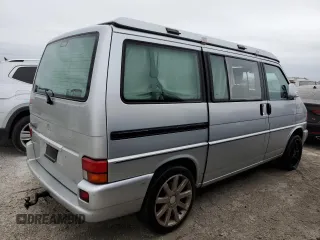 2003 Volkswagen EuroVan MV с VIN WV2NB47083H002700, выставлен на аукционе Copart как лот 76117874 с пробегом 186 942 миль миль и На запчасти • Non repairable. История ставок и продаж доступна на DreamBid. Изображение 3.