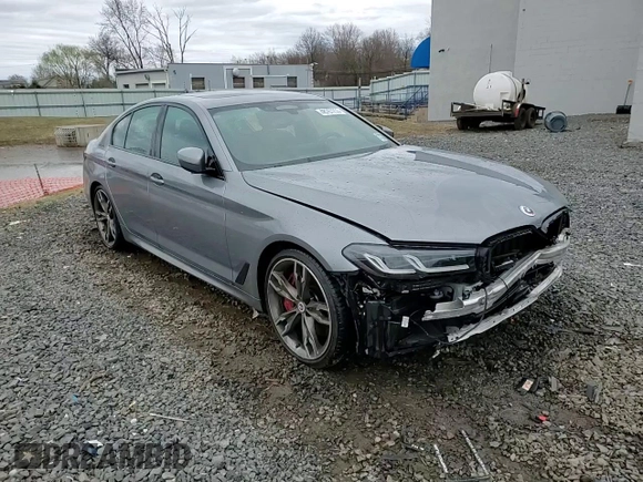 2023 BMW 5 Series M550i xDrive with VIN WBA13BK06PCN02733, listed as a Copart auction lot 48767235 with 27,725 mi miles and Salvage title. Bid and sale history available at DreamBid. Image 13.