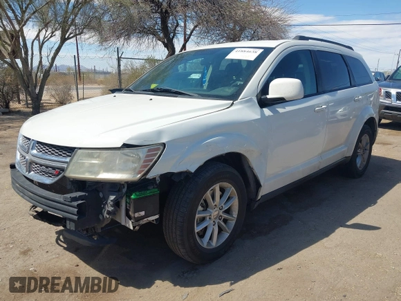 2015 Dodge Journey SXT with VIN 3C4PDCBG5FT644488, listed as a IAAI auction lot 41884638 with 102,677 mi miles and . Bid and sale history available at DreamBid. Image 2.