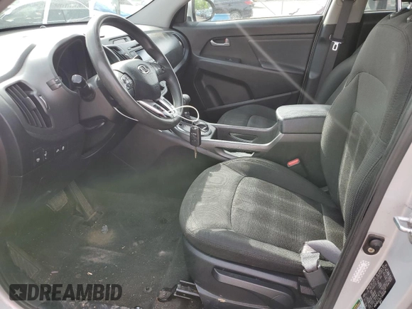 2012 Kia Sportage LX z VIN KNDPB3A29C7264856, wystawiony jako Copart lot #58397685 z przebiegiem 144 621 mil mil oraz Szkoda całkowita • Salvage title. Historia ofert i sprzedaży dostępna na DreamBid. Obrazek 7.