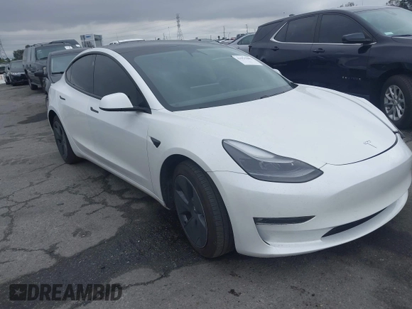 2021 Tesla Model 3 Long Range with VIN 5YJ3E1EB6MF878957, listed as a IAAI auction lot 41915482 with 59,578 mi miles. Bid and sale history available at carsss.com. Image 1.