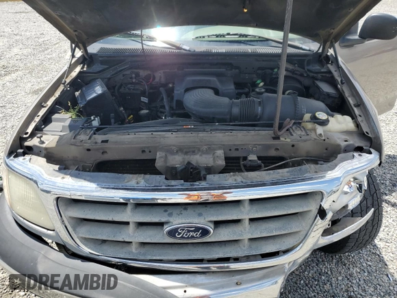 2001 Ford F-150 with VIN 1FTPX17L21NA37619, listed as a Copart auction lot 56922485 with 212,148 mi miles and Salvage title. Bid and sale history available at DreamBid. Image 11.