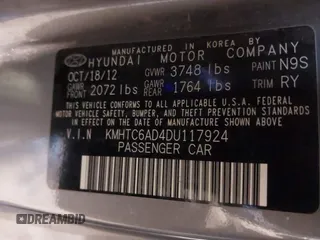 2013 Hyundai Veloster w/Gray Int with VIN KMHTC6AD4DU117924, listed as a IAAI auction lot 41339465 with 156,004 mi miles. Bid and sale history available at carsss.com. Image 9.