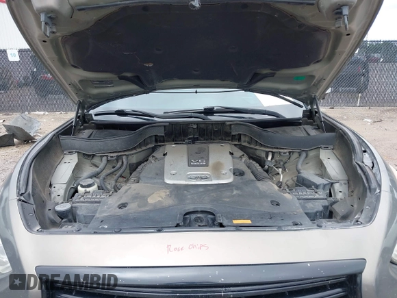 2014 Infiniti QX70 z VIN JN8CS1MU3EM451745, wystawiony jako IAAI lot #42203922 z przebiegiem 144 990 mil mil oraz . Historia ofert i sprzedaży dostępna na DreamBid. Obrazek 10.