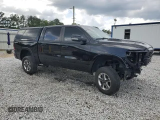 2019 Ram 1500 Laramie with VIN 1C6SRFJT9KN772570, listed as a Copart auction lot 60721145 with 82,599 mi miles and Salvage title. Bid and sale history available at DreamBid. Image 4.