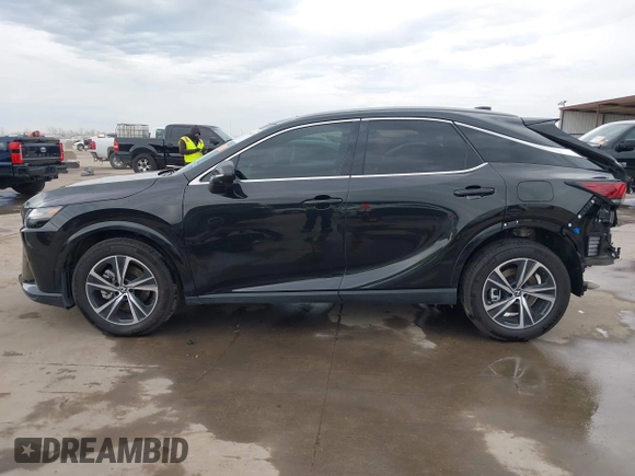 2024 Lexus RX 350 z VIN 2T2BAMBA4RC026361, wystawiony jako IAAI lot #41364276 z przebiegiem 15 528 mil mil oraz . Historia ofert i sprzedaży dostępna na DreamBid. Obrazek 15.