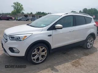 2019 Ford Escape Titanium with VIN 1FMCU9J90KUA86338, listed as a IAAI auction lot 42690159 with 115,891 mi miles and . Bid and sale history available at DreamBid. Image 19.