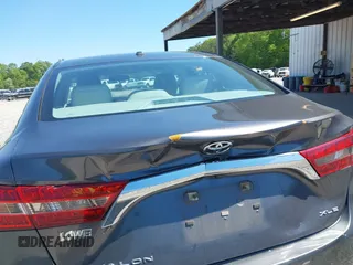 2016 Toyota Avalon Limited with VIN 4T1BK1EB4GU208979, listed as a IAAI auction lot 42032374 with 242,738 mi miles and . Bid and sale history available at carsss.com. Image 6.