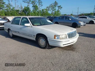 1999 Cadillac DeVille z VIN 1G6KD54Y7XU720668, wystawiony jako IAAI lot #42147461 z przebiegiem 92 054 mil mil oraz . Historia ofert i sprzedaży dostępna na DreamBid. Obrazek 1.