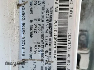 2019 Mazda 3 z VIN JM1BPAJM3K1131108, wystawiony jako Copart lot #57911165 z przebiegiem 65 641 mil mil oraz Szkoda całkowita • Salvage title. Historia ofert i sprzedaży dostępna na DreamBid. Obrazek 12.