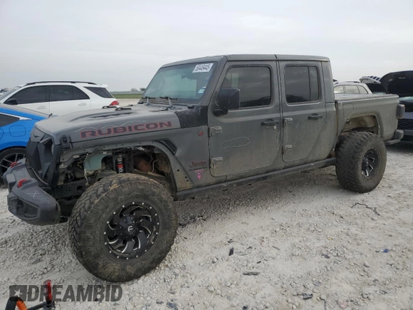 2020 Jeep Gladiator Rubicon z VIN 1C6JJTBG9LL150356, wystawiony jako Copart lot #50449445 z przebiegiem 77 849 mil mil oraz Szkoda całkowita • Salvage title. Historia ofert i sprzedaży dostępna na DreamBid. Obrazek 1.